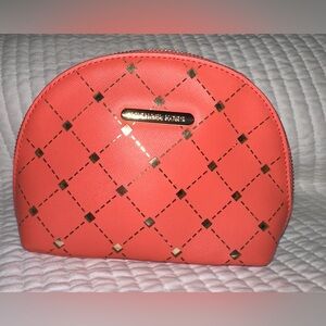 Michael Kors Coral and Gold Pouch, with gold accents.